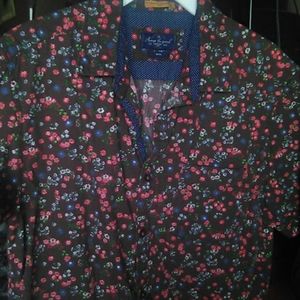 Floral print button up men's shirt.